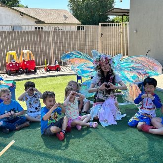 Bubble Fairy with toddlers at Grow and Learn Preschool