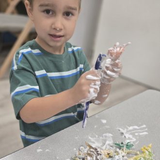 Grow and Learn Preschool - Kallum Cleaning toys
